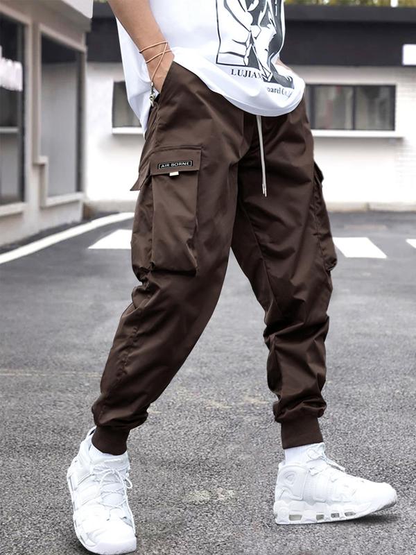 Men's Plain Loose Patched Flap Pocket Drawstring Waist Cargo Pants, Drippy Outfits, Mens Clothing, Casual Street Wear Jogger Pants for Fall, Going Out Outfit, Mens Fall Clothing, Fall Outfits 2024, Back To School Outfits